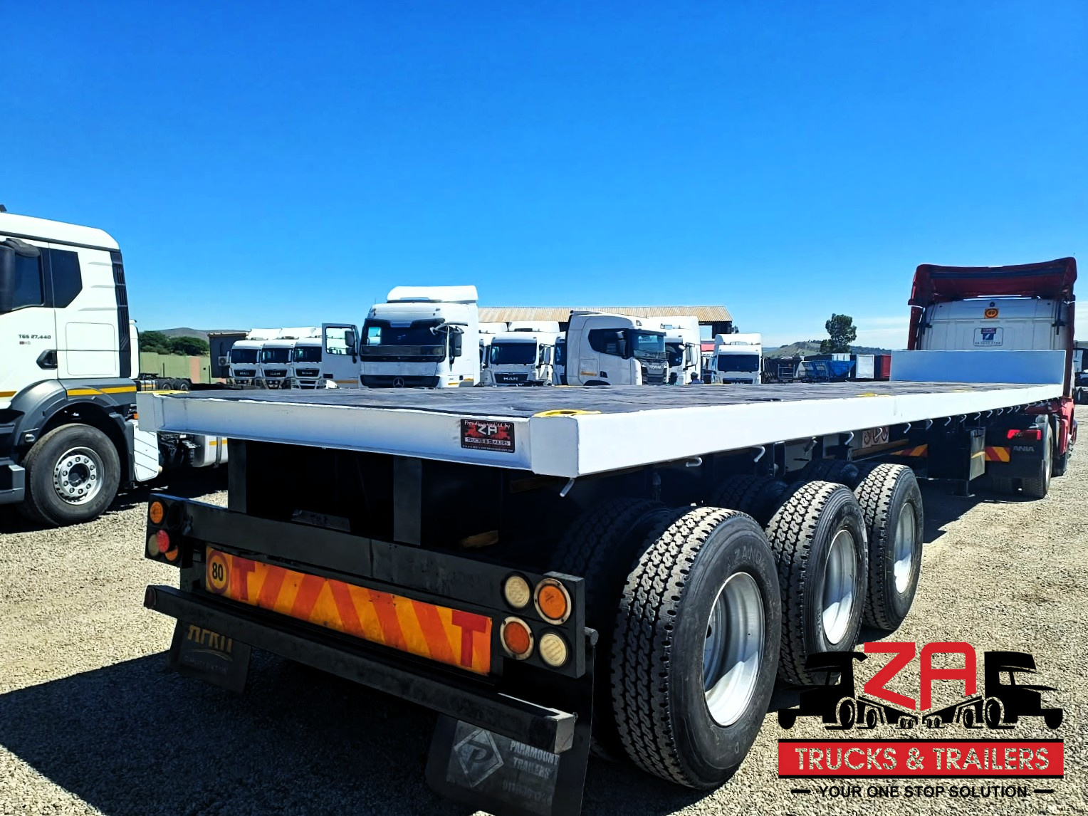 2013 PARAMOUNT TRI AXLE FLAT DECK TRAILER #53332